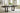 Neymorton - 7 Pc. - Rectangular Extension Table, 6 Side Chairs - Dark Grayish Brown