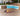 Walton Bridge - 5 Pc. - Square Bar Table W/Fire Pit, 4 Barstools - Driftwood